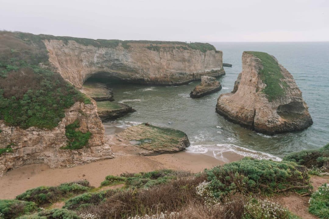 shark fin cove with caves and unique rock formations