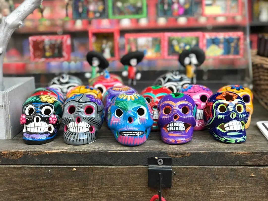 Painted sugar skulls lined up for sale in a shop in Old Town San Diego.