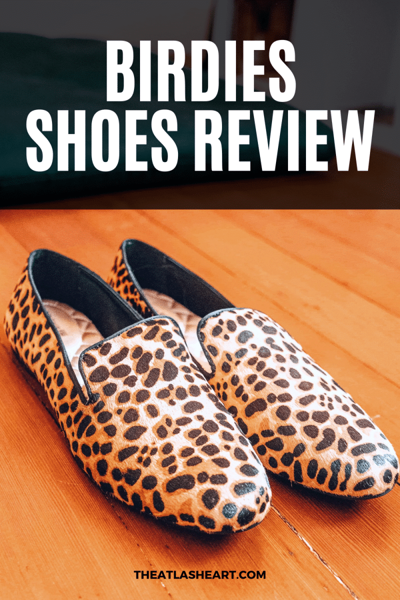 A close up of Birdies shoes on a hardwood floor, with the text overlay, "Birdies Shoes Review."