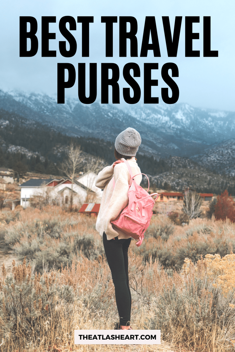 A young woman wearing black leggings, a white sweater, and a pink backpack looks over her shoulder at a snowy mountain landscape, with the text overlay, "Best Travel Purses."