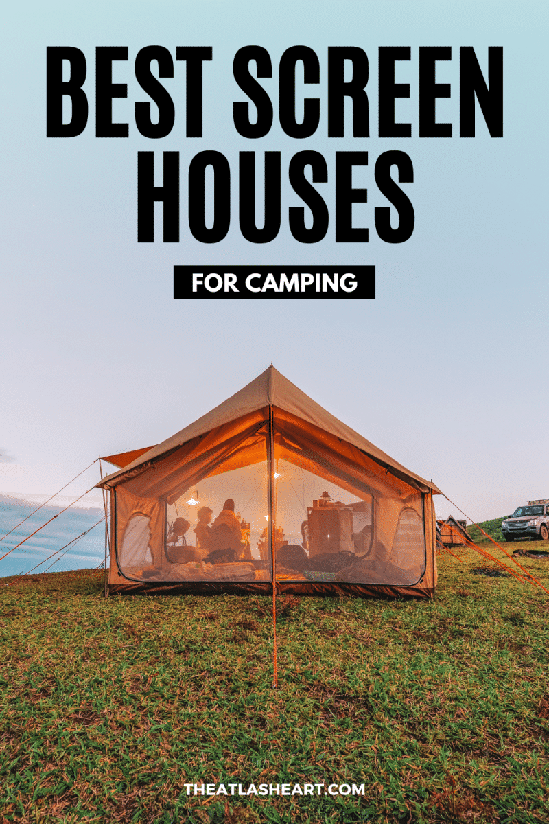 A large, a-frame canvas screen house illuminated at dusk on a grassy campsite overlooking the sea, with the text overlay, "Best Screen Houses  For Camping."