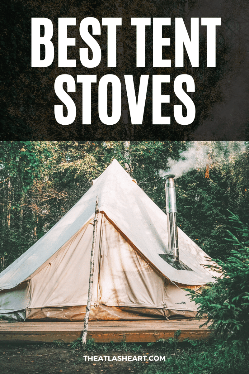 A canvas bell tent on a wooden platform with a chimney from a tent stove emitting smoke and thick evergreen trees in the background, with the text overlay, "Best Tent Stoves."