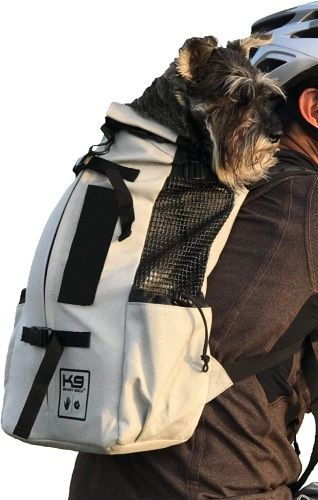 Product photo for the K9 Sport Sack Dog Carrier Adjustable Backpack, with a dog model inside of it.