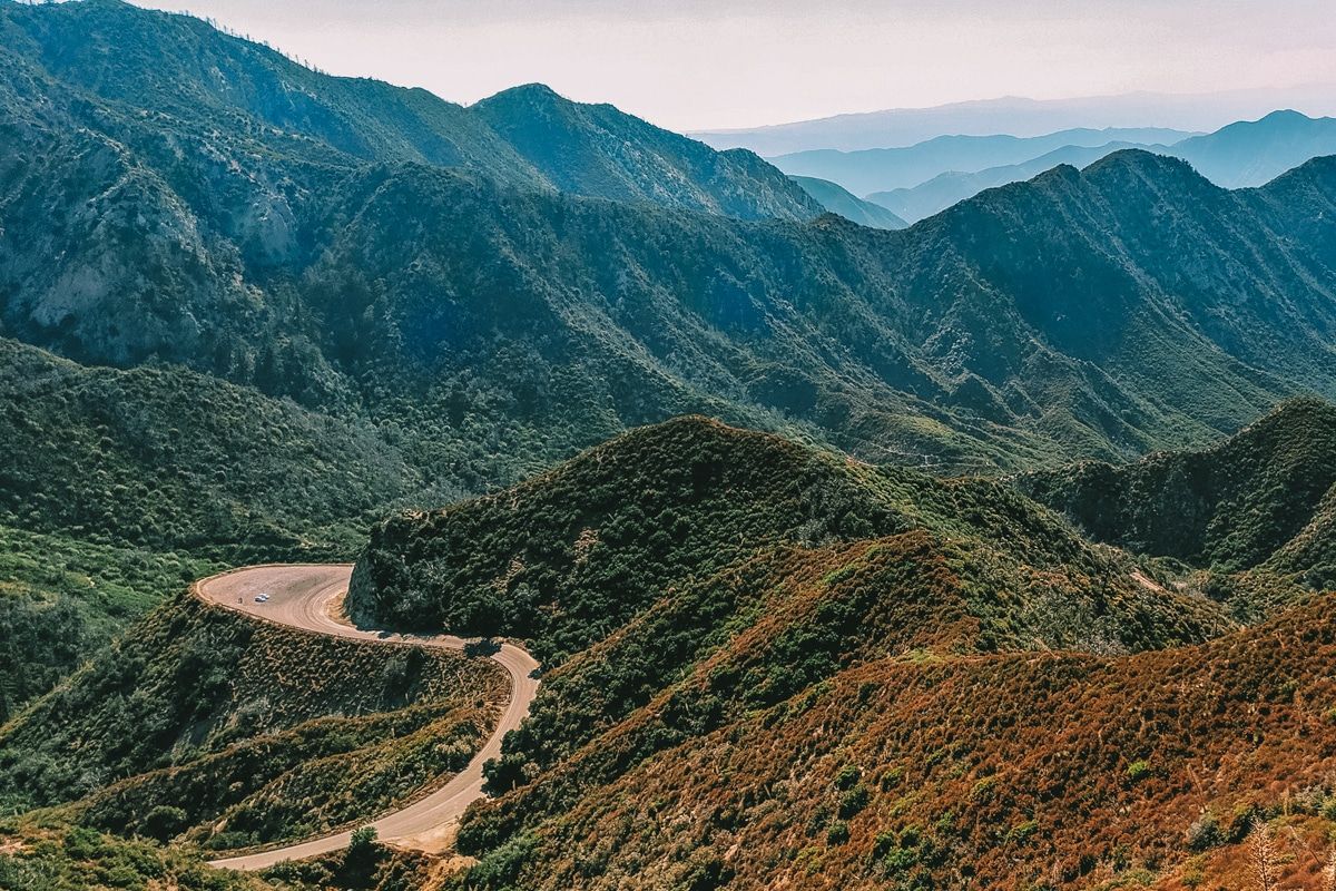 The Angeles crest highway, a winding road through mountains and valleys.
