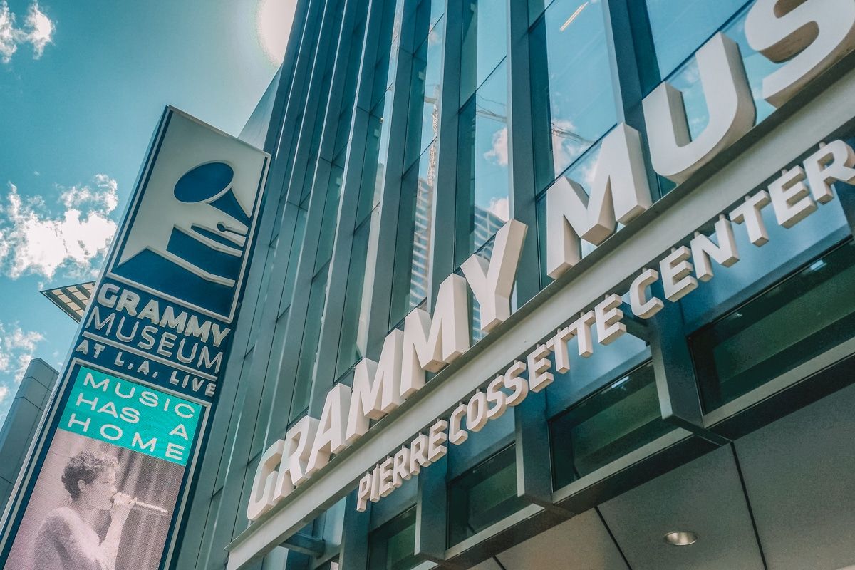 A close-up of the front sign for the Grammy Museum, seen from below.