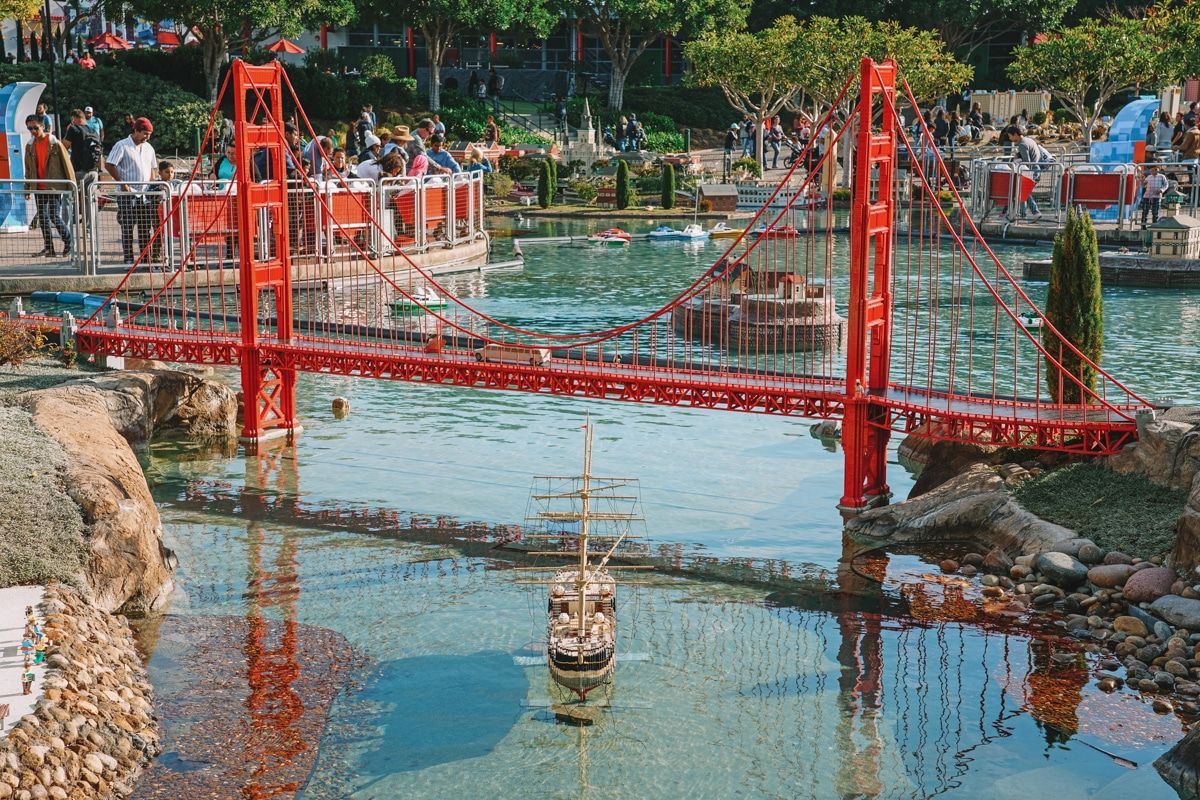 A model of the Golden Gate Bridge spanning a pond at Legoland.