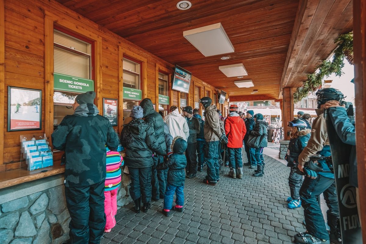 A group of people buying lift tickets in Lake Tahoe.
