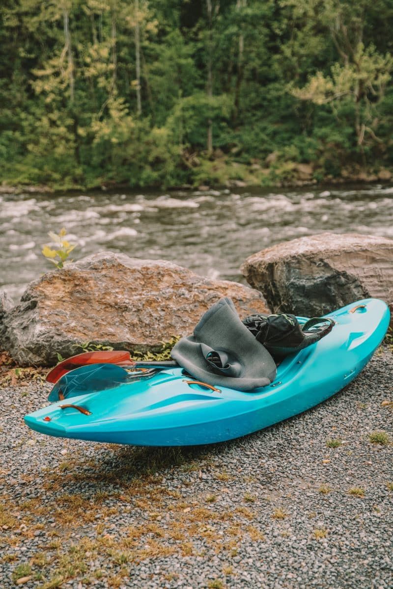 Picture of a whitewater kayak and gear