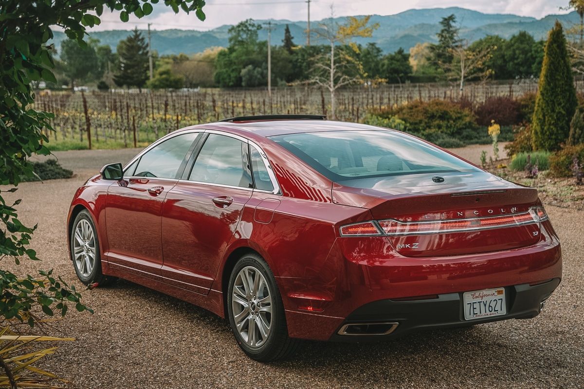 Picture of a red Lincoln car in Napa Valley.