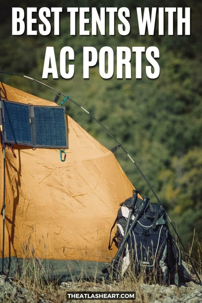 A yellow tent that has a solar panel attached to the outside and a backpack leaning against it, with the text overlay, "Best Tents With AC Ports."