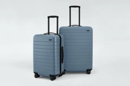 Product image for the Away Premium Luggage Set in slate blue.