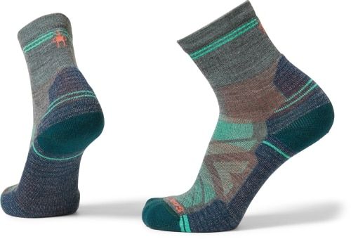 Product image for the Smartwool Performance Hike Light Cushion Mid Crew Socks in grey, orange, and teal.
