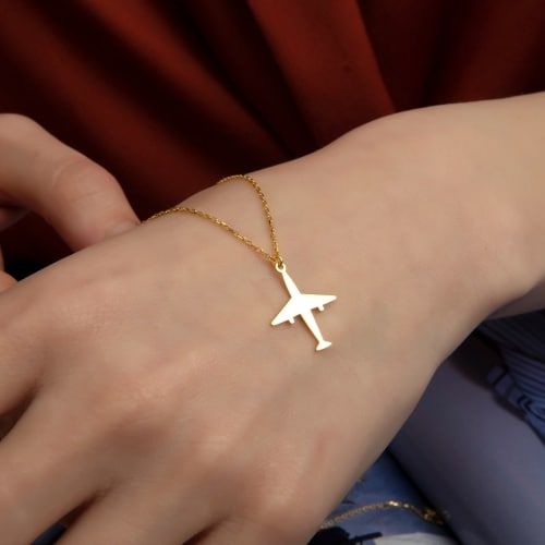 Product image for the 14k Gold Airplane Necklace.