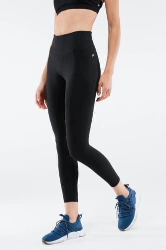 Product image for the Fabletics Powerhold Leggings in black.