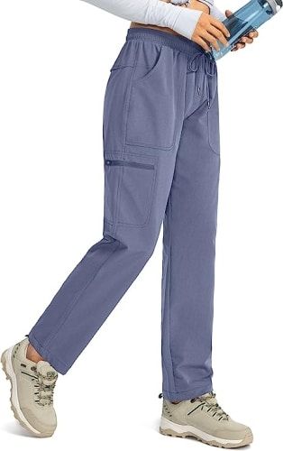 Product image for the Viodia Women's Hiking Cargo Pants in light blue.