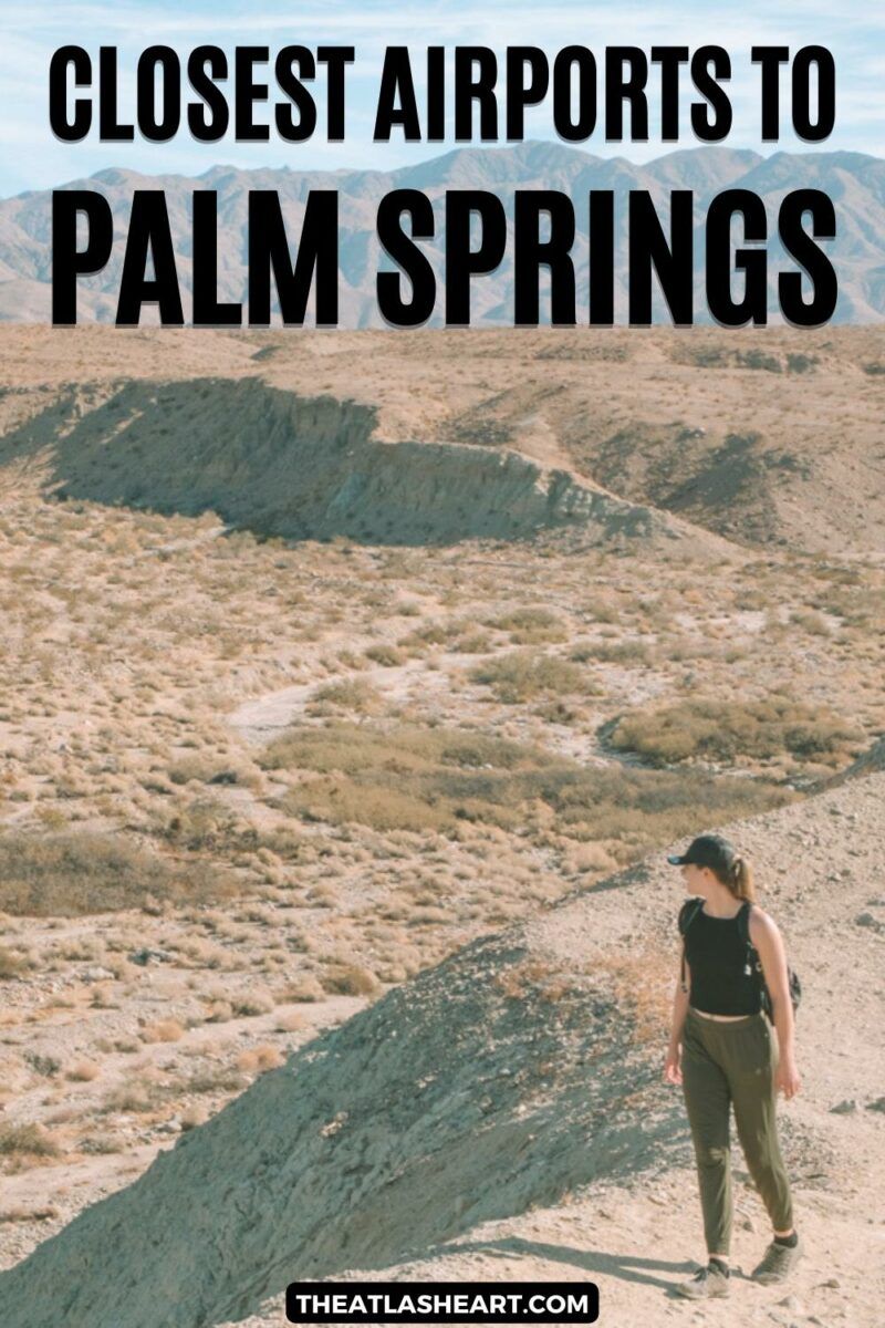 A young woman wearing green pants and a black tank top looking over her shoulder in a desert landscape, with the text overlay, "Closest Airports to Palm Springs."