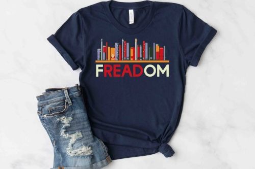 A navy blue T-Shirt that reads "FREADOM" below a bookshelf.