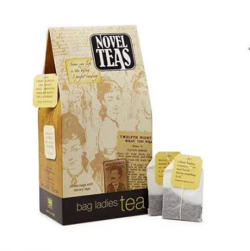 A yellowish fold-over paper container with old sketches of women at a party and the text Novel Teas alongside two propped up teabags