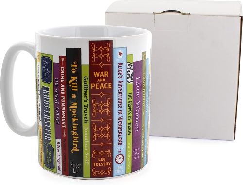 A white mug wrapped in images of the bindings of famous books with a box in the background.