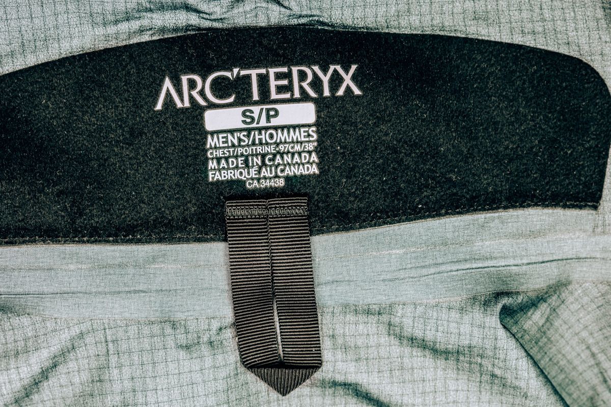 Close-up of the label on an Arc'Teryx jacket showing the size.