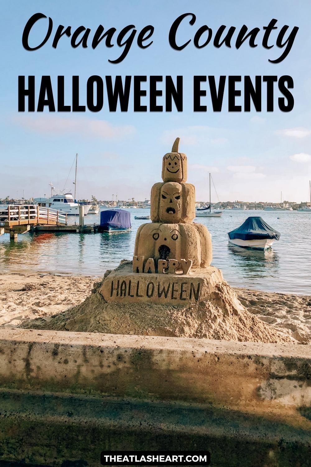 A Hallloween-themed sandcastle with the words, "Happy Halloween" carved into it on a beach with a a dock and boats in the background, with the text overlay, "Halloween Events in Orange County."