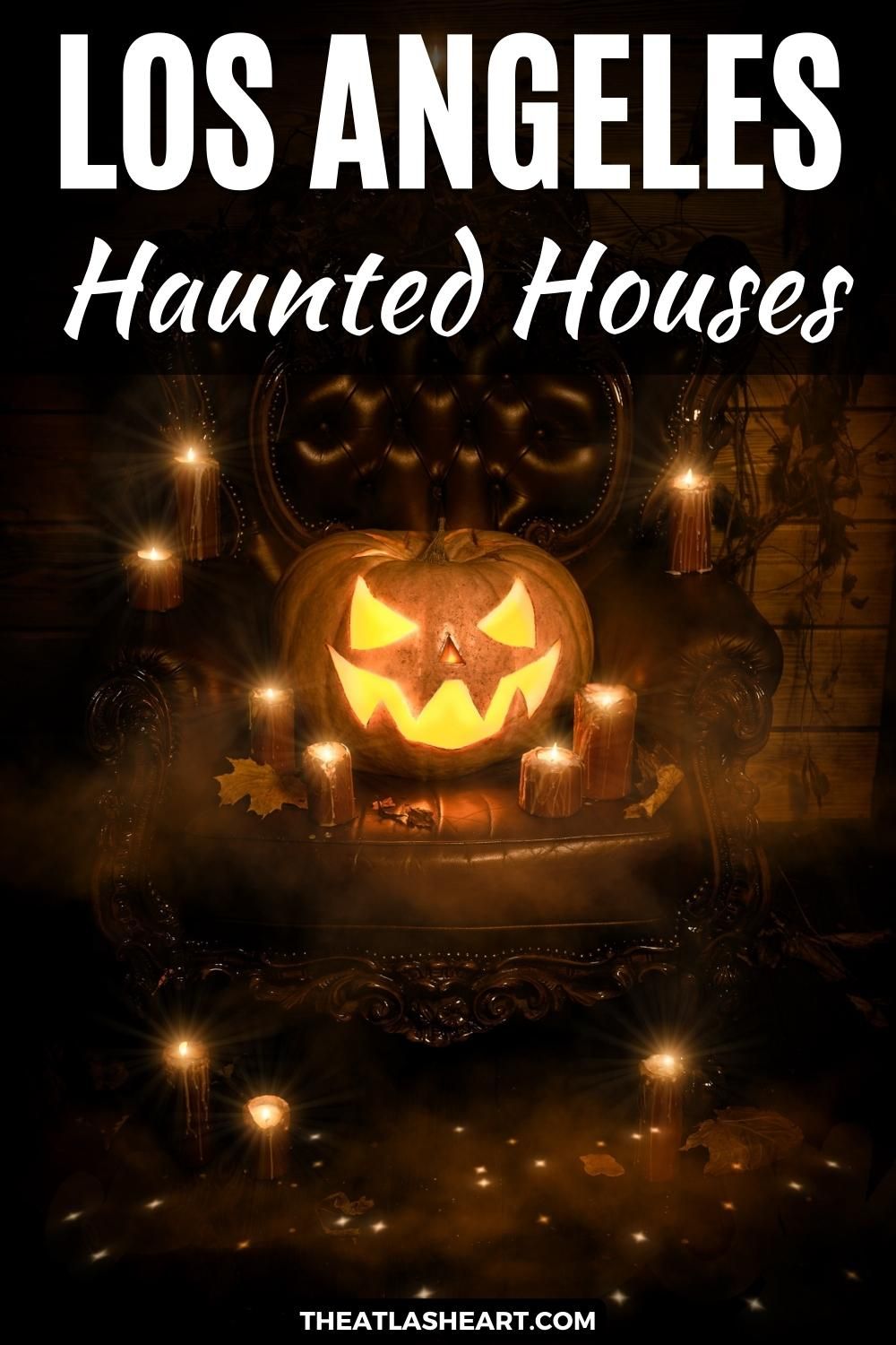 A glowing jack-o-lantern in dim light sits on an ornate leather armchair, surrounded by candles and fall leaves, with the text overlay, "Los Angeles Haunted Houses."