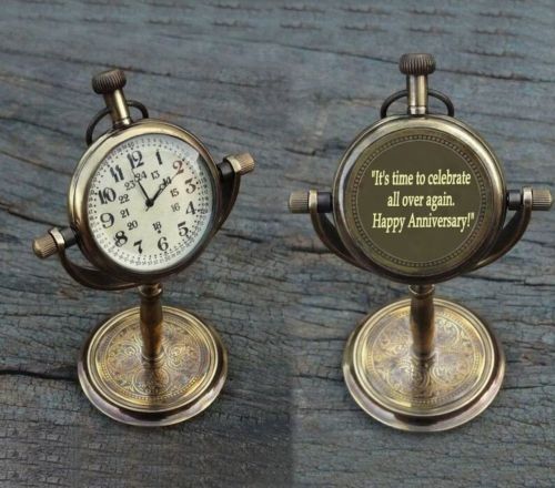 Product image for the Anniversary Gift Brass Desk Clock, with both the front and back pictured side by side.