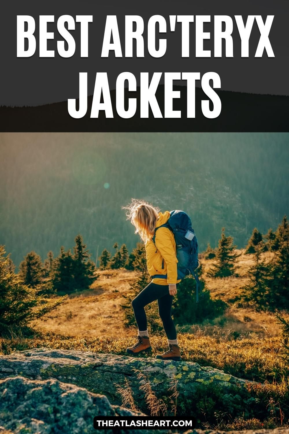 A blonde woman seen in profile wearing a yellow windbreaker, black leggings, and a blue backpack hiking over mountainous terrain in golden afternoon light, with the text overlay, "Best Arc'teryx Jacket."