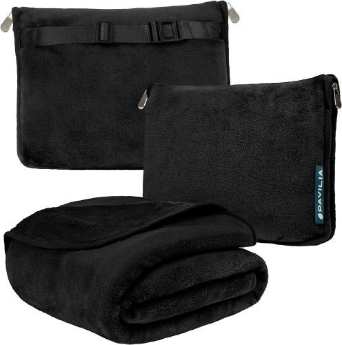 Blanket
A black blanket shown in three stages: 1) folded 2) inside of a zippered pouch 3) from the back to display the strap and buckle on the back of the zippered pouch.
