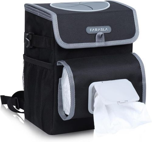 Car Trash Can
A black soft-sided box with a mesh side pocket, front wet wipe compartment, and on top, a circular rubber lid that presses open to put garbage inside.
