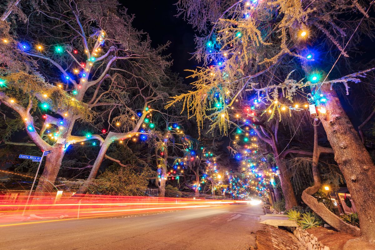 Christmas Tree Lane, Altadena
Trees lining a road are decorated with colorful Christmas lights, as cars make light streaks across the bottom of the image thanks to a slow shutter speed.