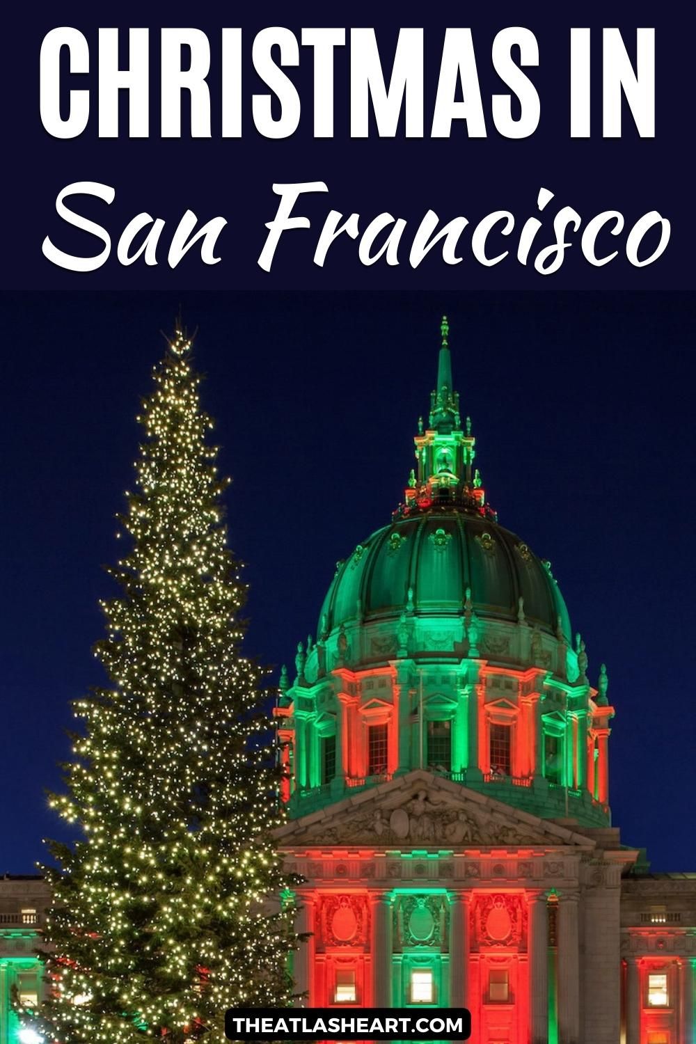 San Francisco City Hall seen at night illuminated by red and green lights, with a large Christmas tree in the foreground, with the text overlay, "Christmas in San Francisco."