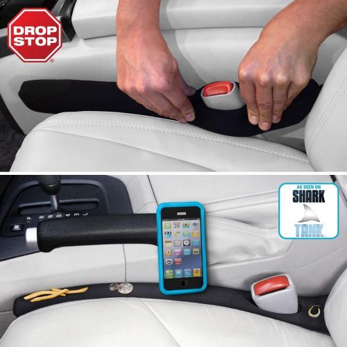 Drop Stop Car Seat-Gap Filler
Two image: Image #1 shows hands pressing a black form-fit piece of plastic into the space between the center console and the seat, around the seatbelt buckle; image #2 is of the plastic guard preventing a phone, coins, and french fries from falling into the crevice.