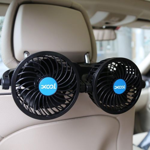 Electric Car Fans
Two black cantaloupe-sized fans attached to the back of a car headrest.