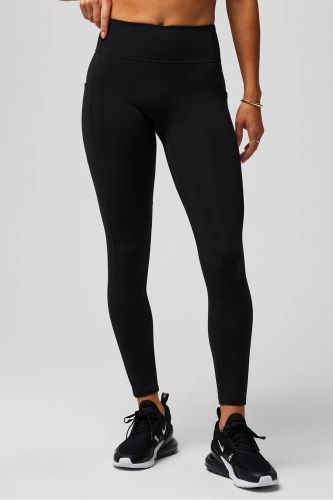 Product image for the Fabletics Anywhere Motion365+ Utility Legging in black.