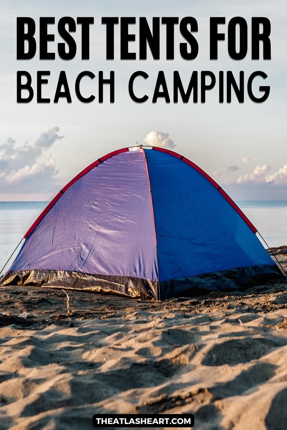 A blue and purple tent on a sandy beach with a calm sea and a partly cloudy sky in the background, with the text overlay, "Best Tents for Beach Camping."