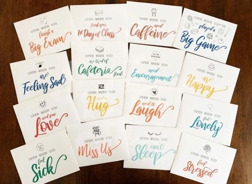 'Open when' envelopes college set printed with meaningful messages.