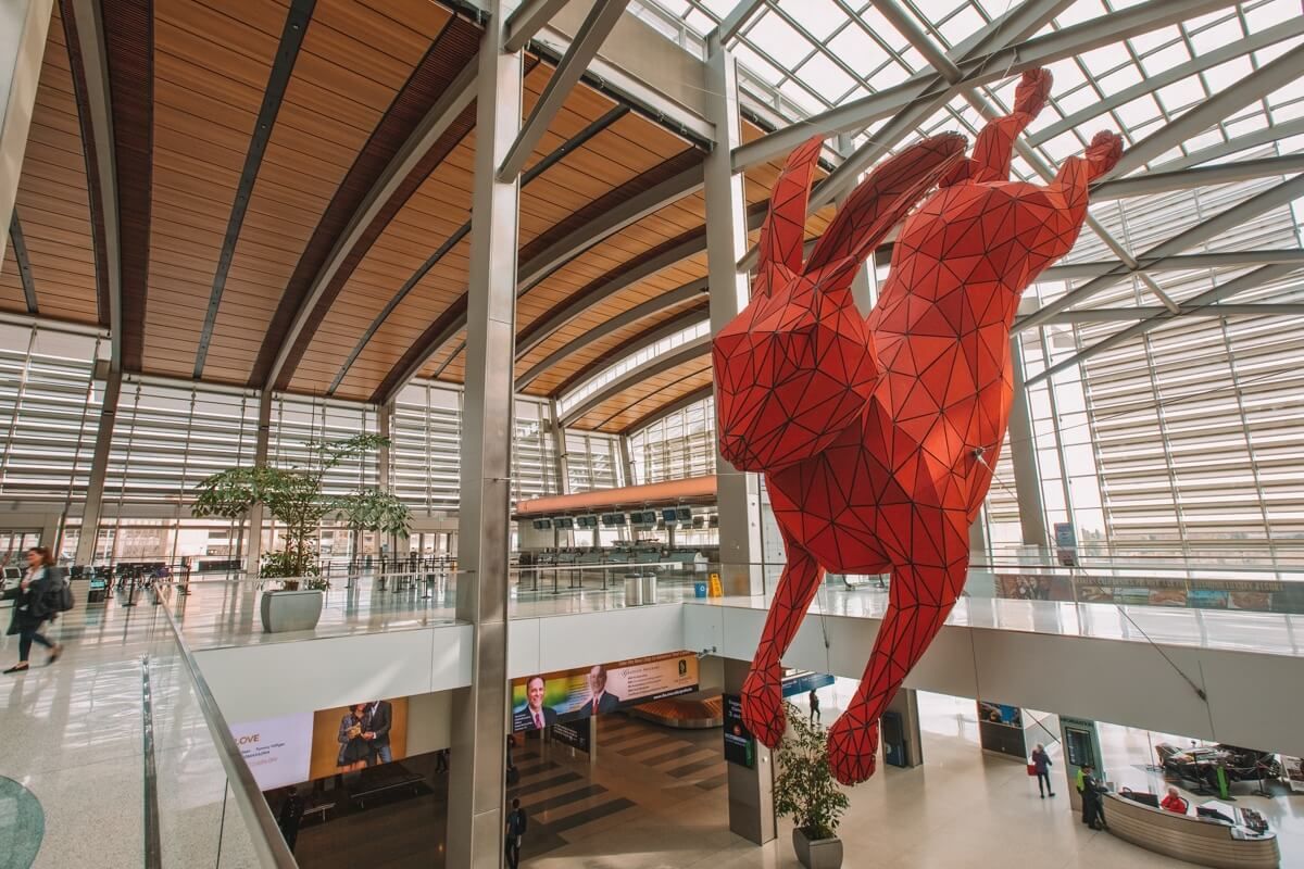 Image of the red rabbit sculpture hanging at Sacramento International Airport