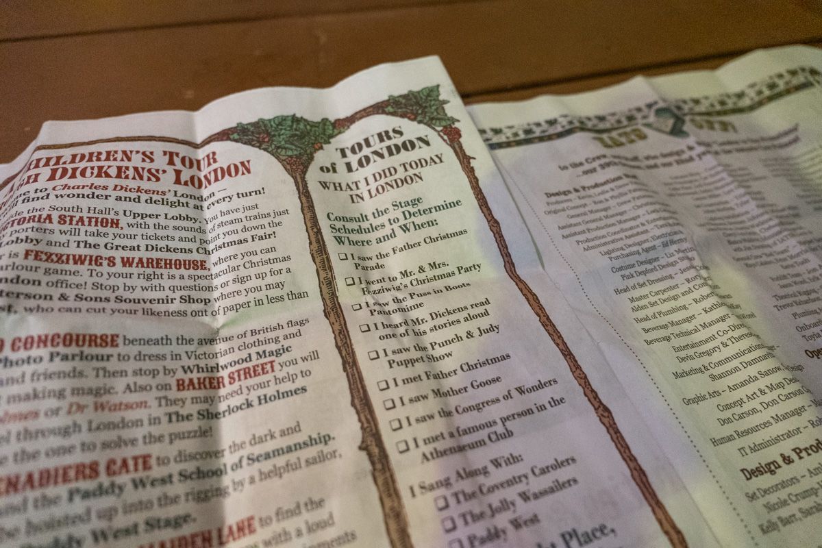 A close-up of a paper map of the Dickens Fair, which lists all of the events and things to see. 